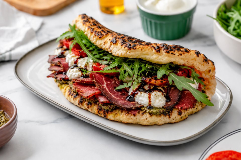 Panuozzo Campione — pastrami, bresaola, stracciatella
